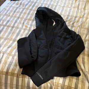 Lululemon cropped jacket. Super cute . Tight fitting . Size 6. Wore once.